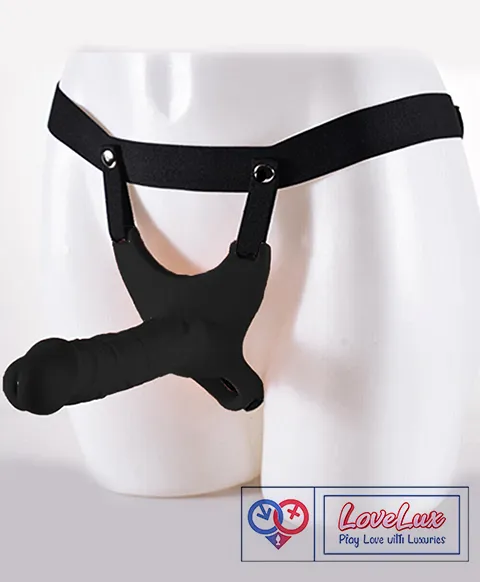 realistic hollow strap on dildo in black with wearable silicone sleeve design. Comfortable, body-safe, and secure fit India By besharamtoys.com